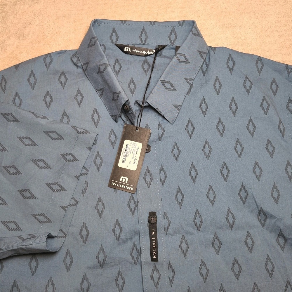 NWT Travis Mathew Button Up Golf Shirt Blue Short Sleeve Men Sz M Geometric